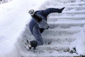 A woman slipped and fell on a wintry staircase